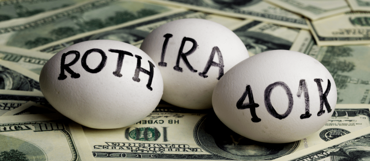 Three eggs labeled Roth IRA, IRA, and 401(k) resting on a pile of hundred-dollar bills, representing different retirement account types