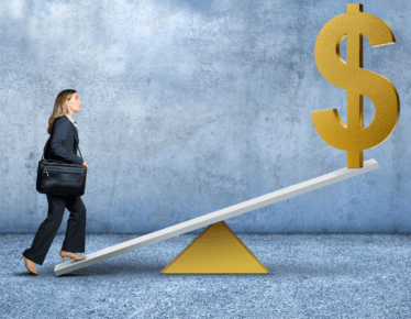 A businesswoman walking up a seesaw toward a large dollar sign, representing how leverage can grow small principal into outsized income